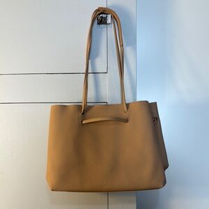 8 other reasons tan purse with dust sleeve